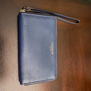 Navy blue Coach wristlet